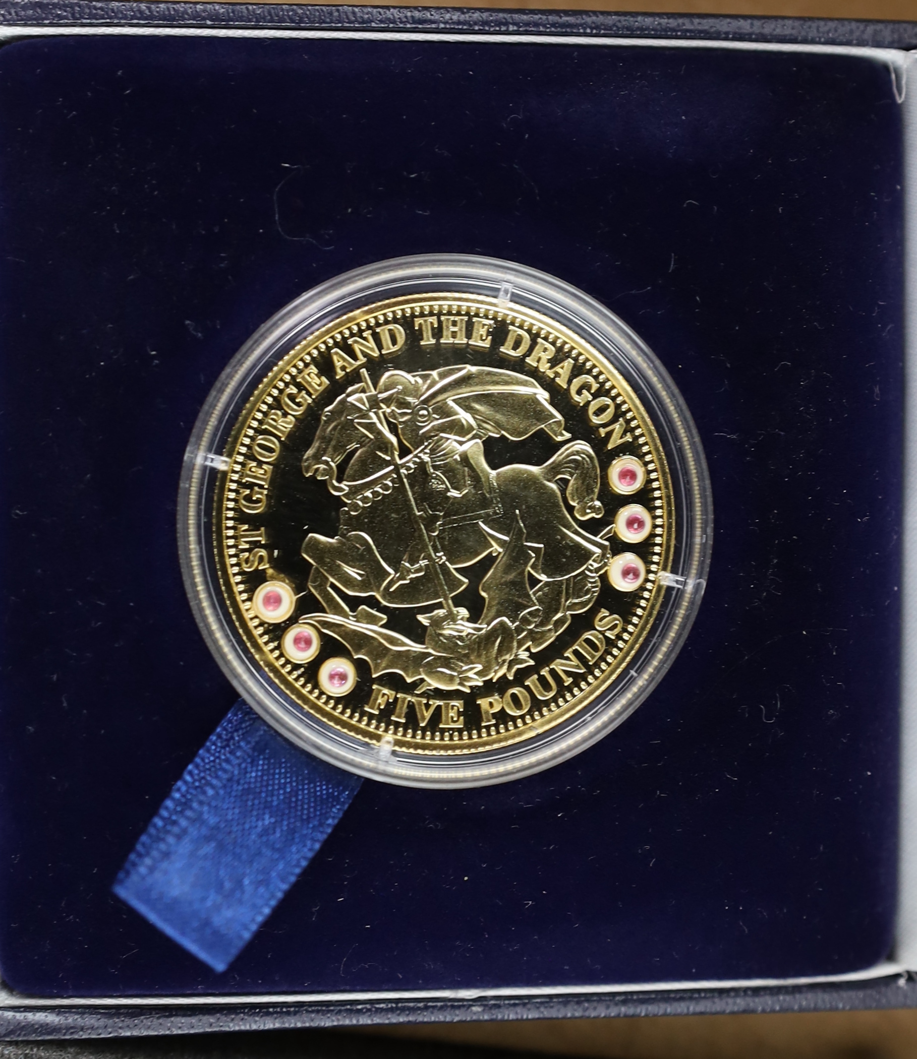 QEII and modern commemorative proof silver coins - Jersey 2014 2oz. ‘100 poppies’ coin, the First World War Centenary 2oz. numisproof, two London Mint 2009 Tristan de Cunha £5 coins, Royal Mint 2009 countdown XXX Olympia